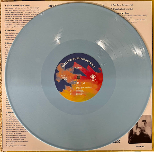 Wombo : Blossomlooksdownuponus (LP, Album, Pow)